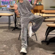 Herren-Zweiteiler mit Kurzarmshirt und weiter Hose